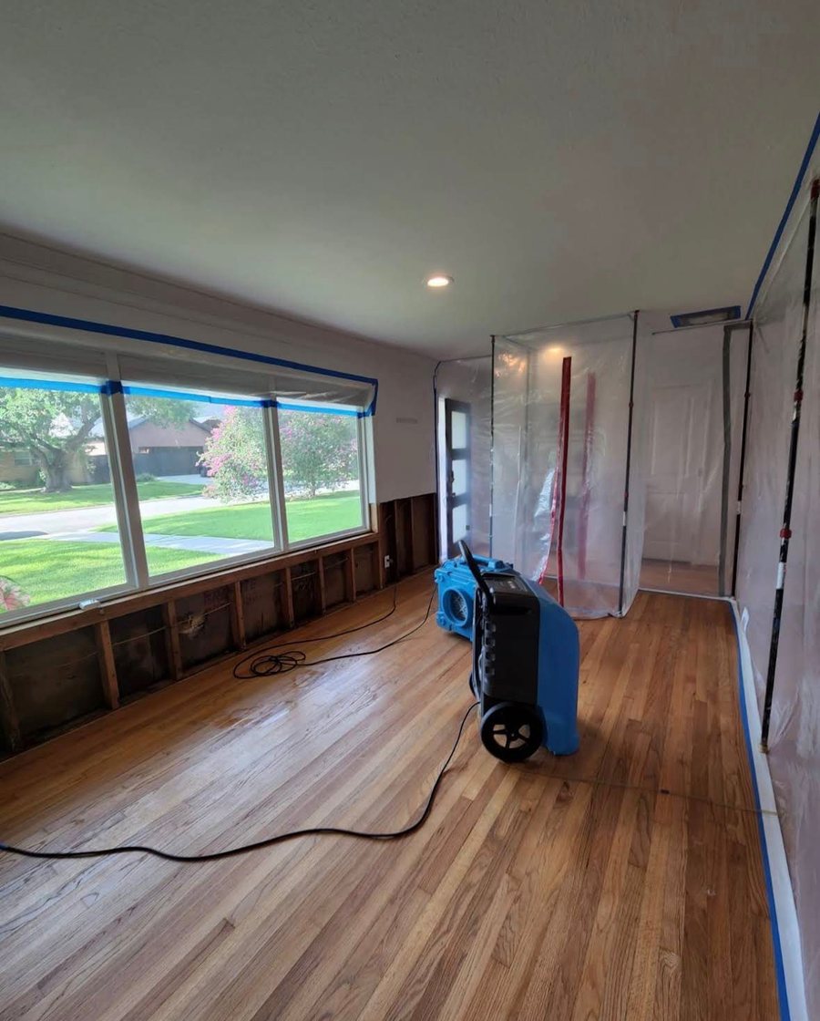 Structural drying with LGR dehumidifier and containment barriers in Miami living room